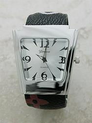 Stainless Steel Backed Flower Designer Bangle Watchstainless 