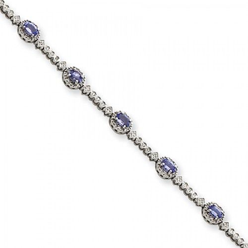 Oval Shape Tanzanite and Diamond Bracelet in 14kt White Gold - Interesting