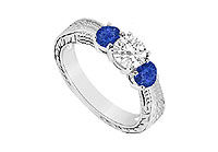 Three Stone Sapphire and Diamond Ring : 14K White Gold - 0.33 CT TGW