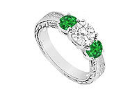 Three Stone Emerald and Diamond Ring : 14K White Gold - 0.75 CT TGW