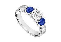 Three Stone Sapphire and Diamond Ring : 14K White Gold - 0.75 CT TGW