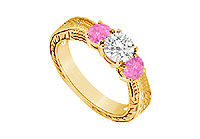 Three Stone Pink Sapphire and Diamond Ring : 14K Yellow Gold - 0.33 CT TGW