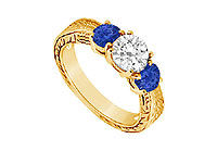 Three Stone Sapphire and Diamond Ring : 14K Yellow Gold - 0.75 CT TGW
