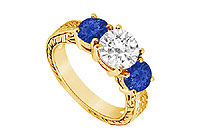 Three Stone Sapphire and Diamond Ring : 14K Yellow Gold - 1.50 CT TGW