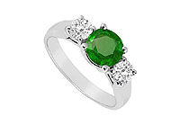 Three Stone Emerald and Diamond Ring : 14K White Gold - 0.75 CT TGW