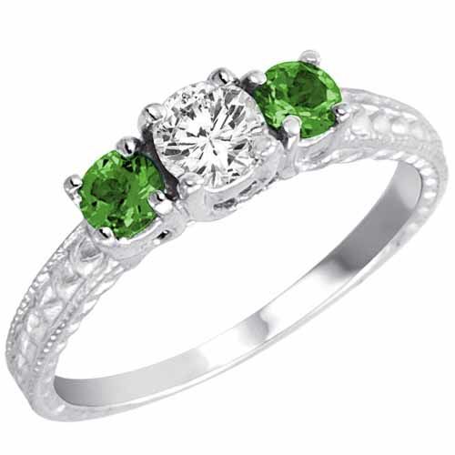 Platinum Round 3 Stone Diamond and Emerald Engagement Ring With Cobra Design Shank (0.95 cttw)
