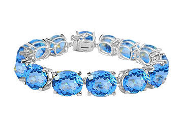 14K White Gold Prong Set Oval Blue Topaz Bracelet with 50.00 CT TGW