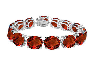 Sterling Silver Prong Set Oval Garnet Bracelet with 50.00 CT TGW